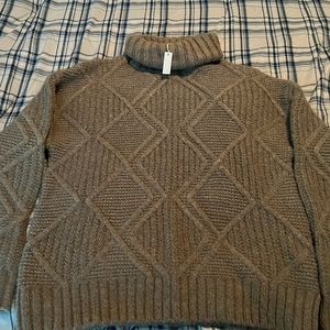 Turtleneck Sweater
CASLON®